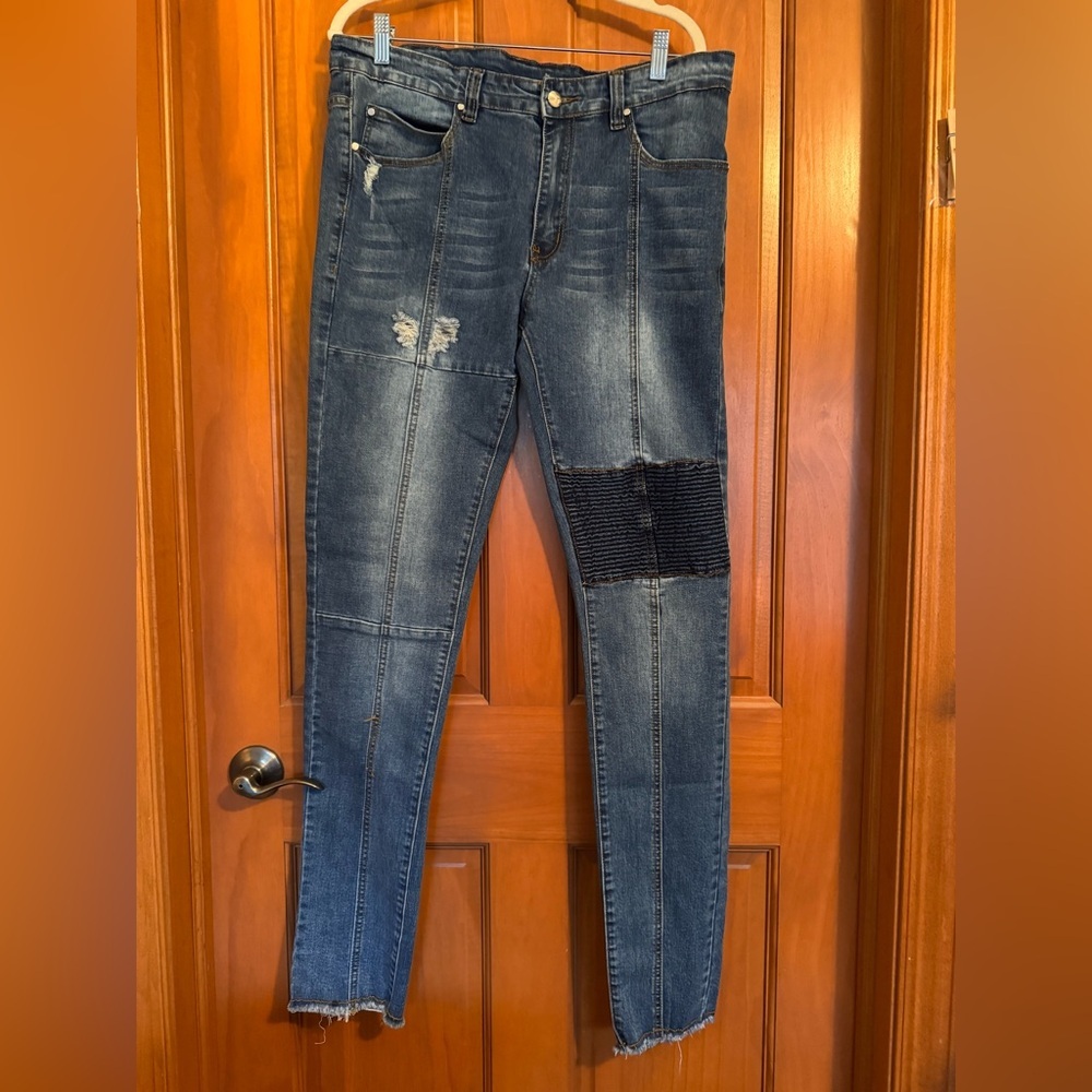 Distressed Denim Jeans with Black Patch